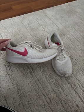 Nike Women’s White Athletic Sneakers with Pink Swoosh